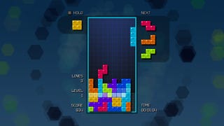 A game of Tetris Time Warp in Tetris Forever - the well is filling up with colourful blocks.