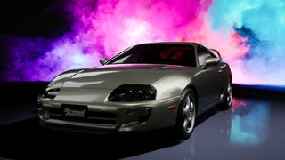 A silver Toyota in front of a colourful smoke cloud in Tokyo Xtreme Racer