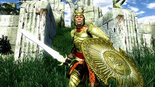 An Elder Scrolls 4: Oblivion screenshot showing a knight in golden armour wielding a huge sword and shield as he stands in front of a bleached white ruin beneath bright blue skies.