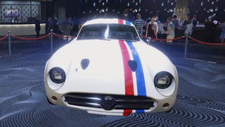 gta online white with red and blue stripe benefactor stirling gt car on diamond casino podium front view