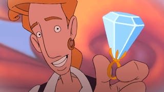 A screenshot from The Curse of Monkey Island showing hero Guybrush Threepwood presenting a gigantic diamond ring to the camera - to Elaine. He is all smiles and blonde hair. Little does he know that the ring is cursed.