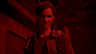 The Last of Us Part 2 Remastered screenshot showing protagonist Ellie bathed in red light with an angry expression on her face.