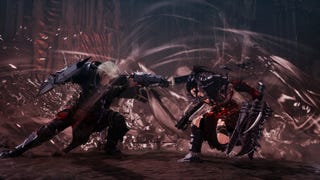 In a dramatic combat scene, two armored warriors clash fiercely. The male fighter on the left wields a large shield and sword, while the female fighter on the right, dressed in dark armor and red accents, holds dual weapons.