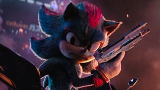 Sonic the Hedgehog 3 trailer showing close up of Shadow holding a pistol on a motorbike